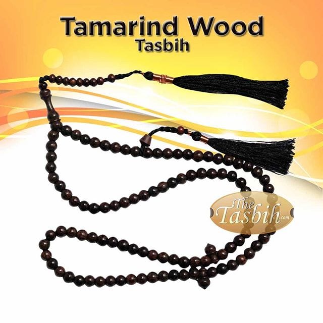 Elegant tamarind wood tasbih with two copper decorated tassels.